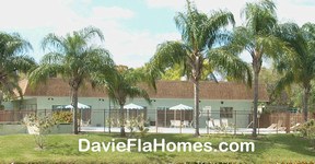Clubhouse and pool at Villas of Arista Park in Davie FL